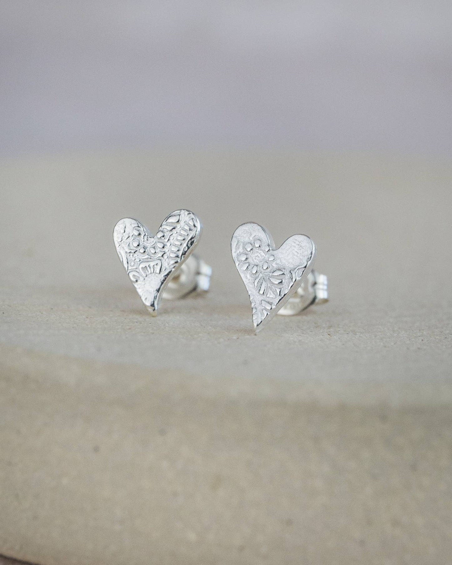 Sterling Silver Textured Tilted Heart Stud Earrings